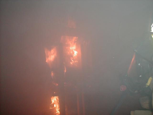 A VIEW OF A SMALL FIRE INSIDE